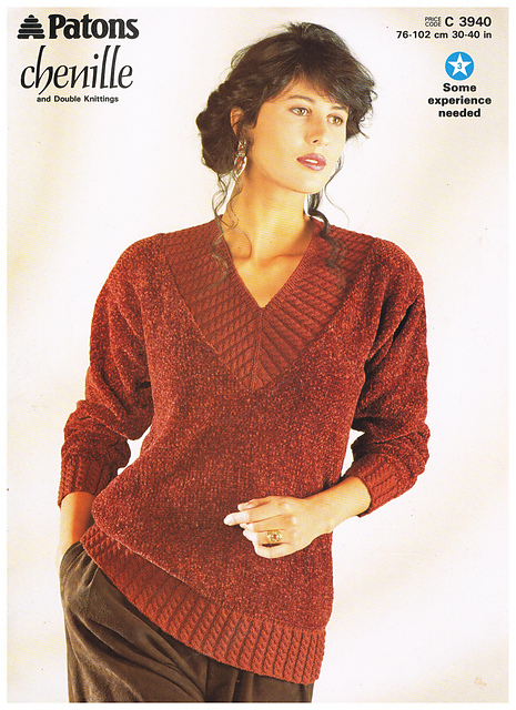 Sweater with cabled ribbing