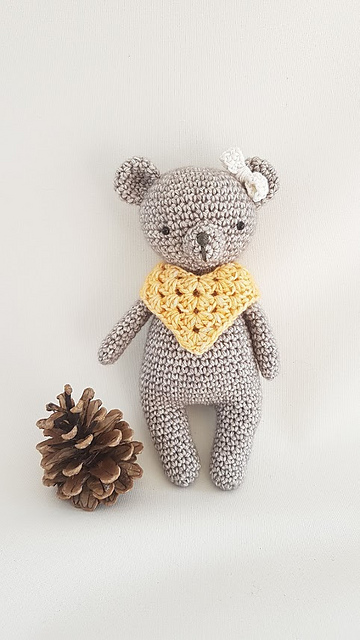 bear with poncho and bow