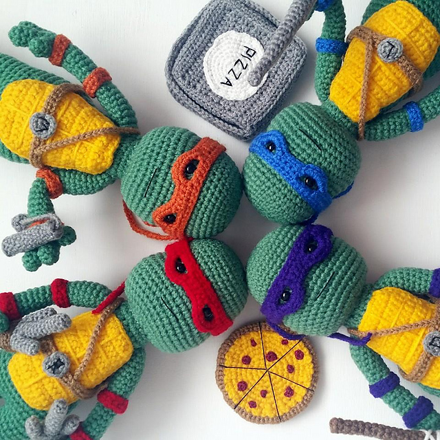 Teenage Mutant Ninja Turtles With A Mini Pizza