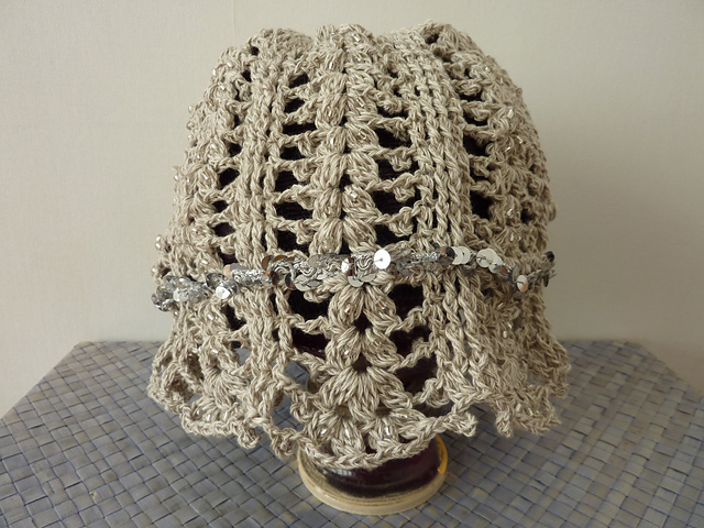 Lacy hat with beads and sequins