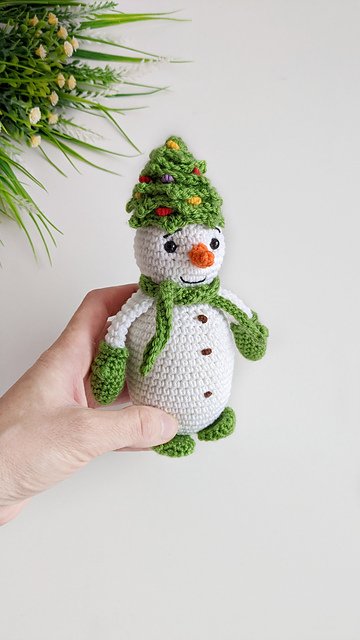 Snowman in a Christmas tree