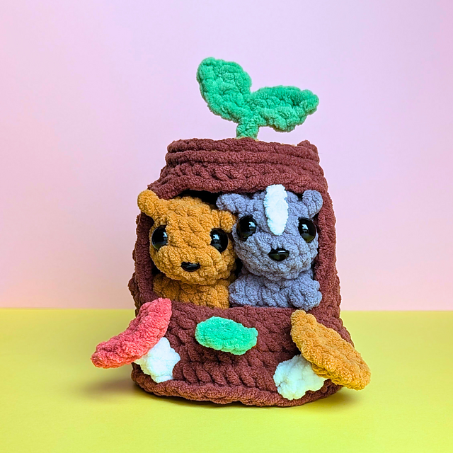 Squirrel and Skunk in a Stump