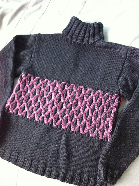 Design 16 Polo neck jumper with a Fair Isle rib panel, which is then smock finished