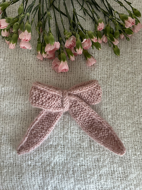 Bittens rosa sløyfe