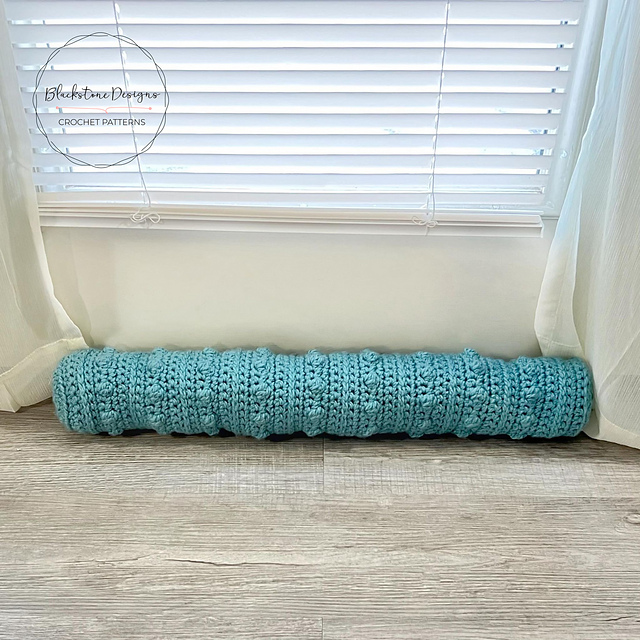 Ravelry Chunky Bobble Draft Blocker pattern by Sonya Blackstone