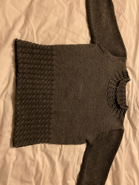 # 05 Jacke mit Zopf- und Lochmuster