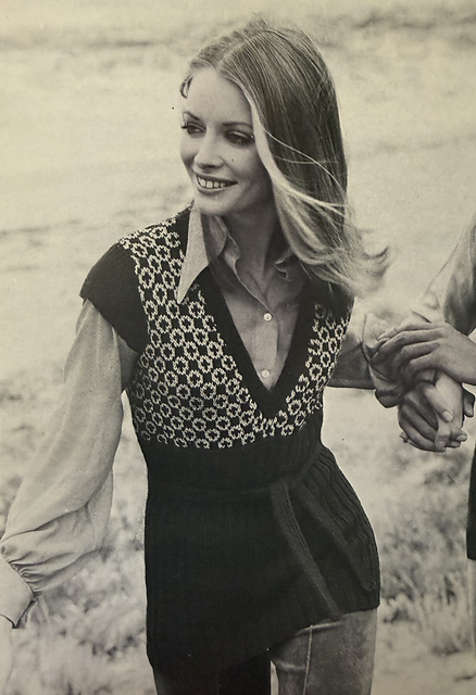 Her cap sleeve sweater