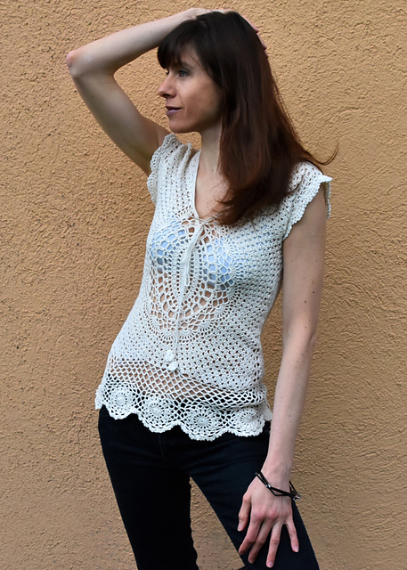 Top with oval motifs