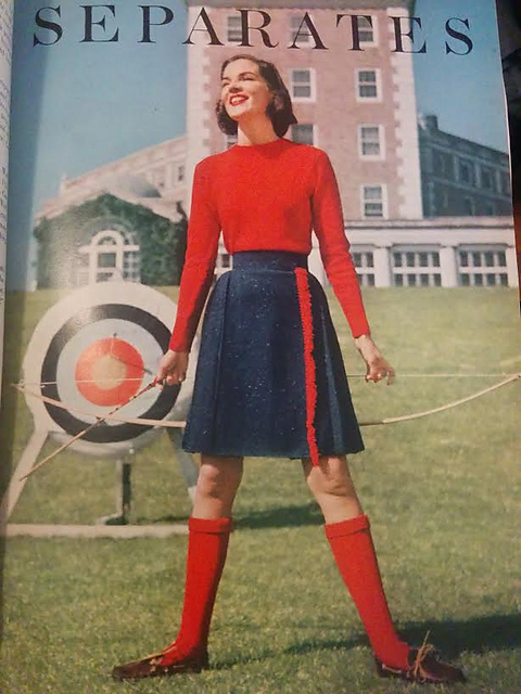 Sweater, fringed kilt, high socks