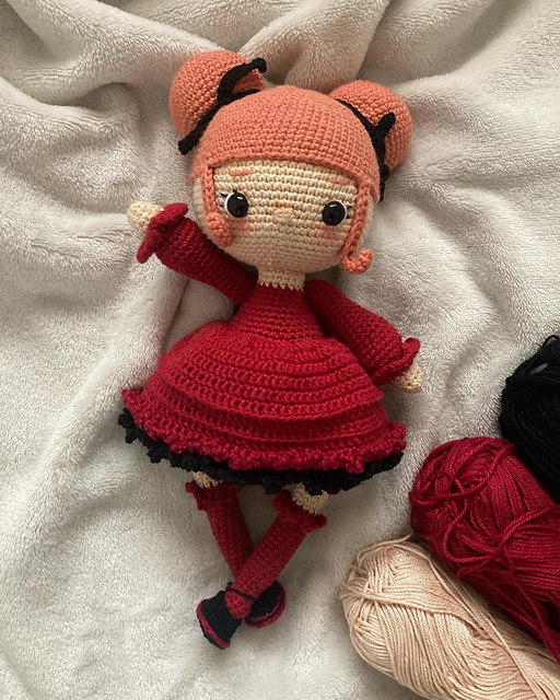 Felix in red dress