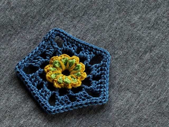 Pentagon motif with double-layered flower