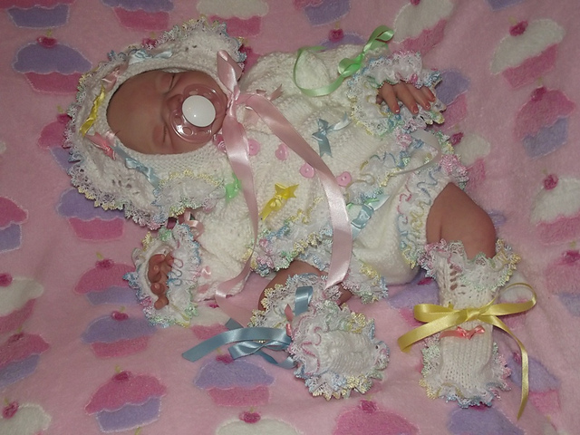 23. Girls Frilly Cardigan Set
