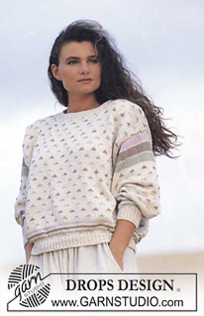 Ravelry: 13-21 Jumper with triangle pattern pattern by DROPS design