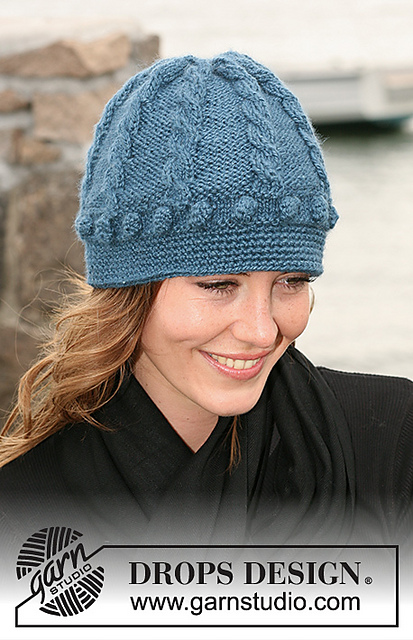 102-25 a Hat with cables, bobbles and crochet edge