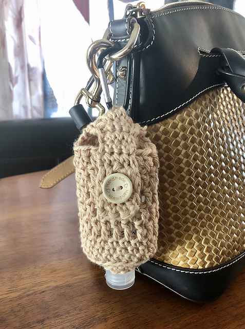 Hand sanitizer holder