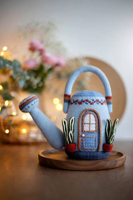 Watering can house