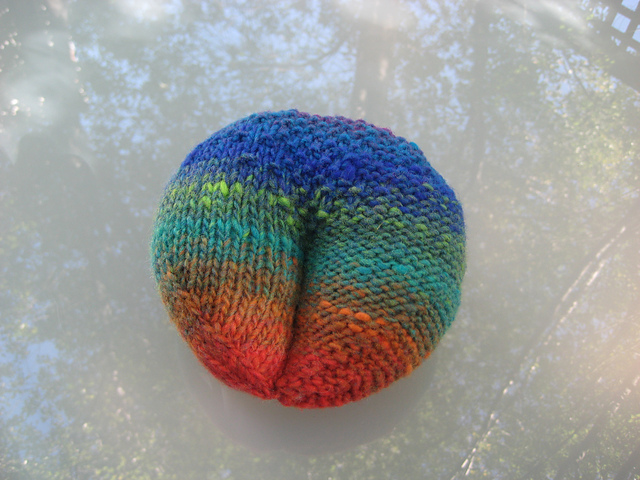A knitted cross-cap