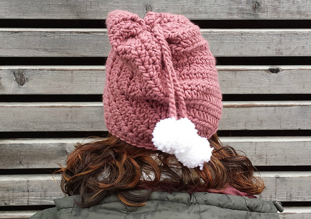 Slouchy hat with pom poms