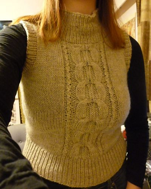 27-28-11 Sleeveless Cabled Sweater