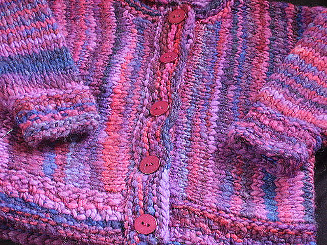 Nonpareil- size 3-6 mos. baby sweater in 3 gauges