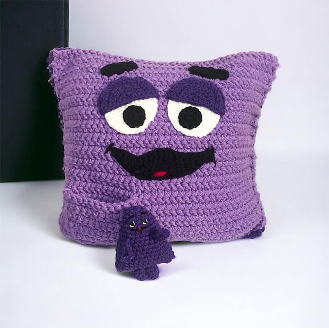 Ravelry: Grimace Cushion and Pocket Pal pattern by Trish Hoskin
