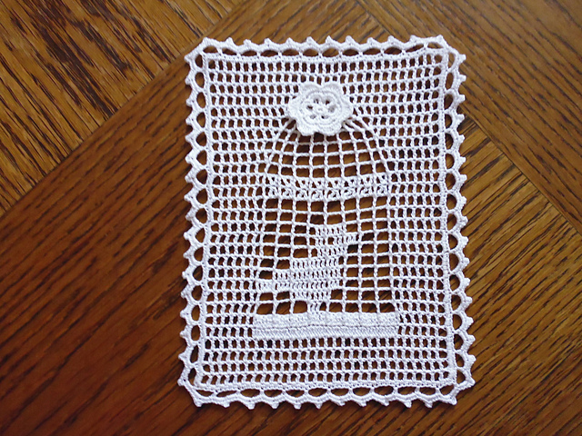 Bird cage doily