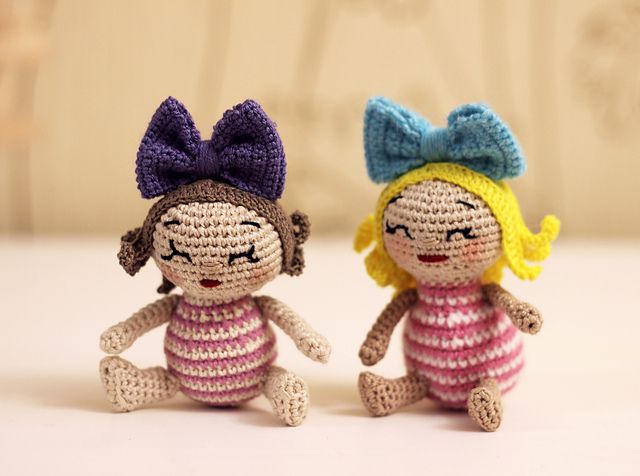 Little doll with bow