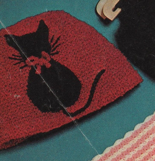 Kitten motif for a nursery cosy