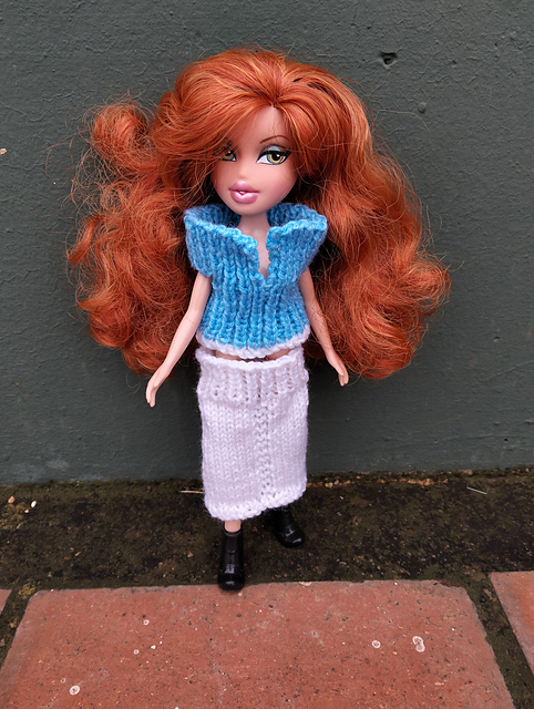 #0231 Turquoise top and white skirt