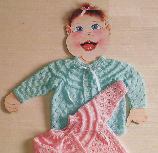 Dainty aqua matinee jacket