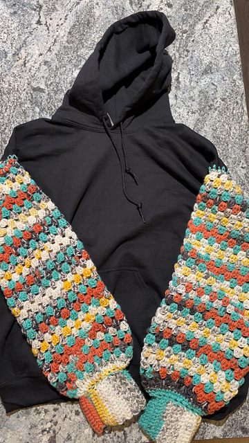Ravelry: Sweatshirt with Crocheted Sleeves pattern by Andi Dingler