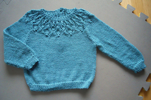 Sweater with lacy yoke