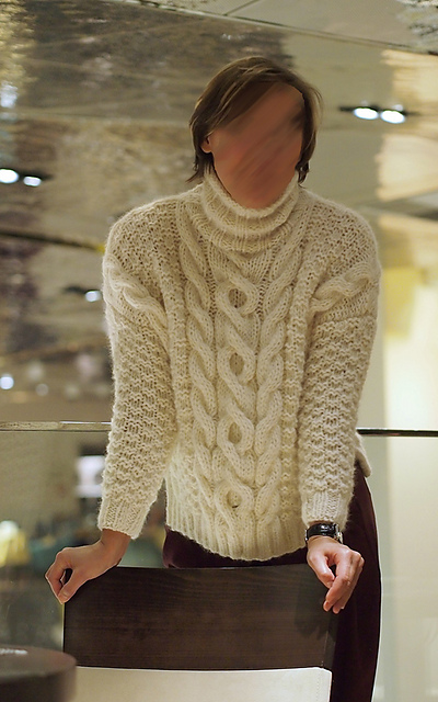 Rollkragenpullover mit Zopf
