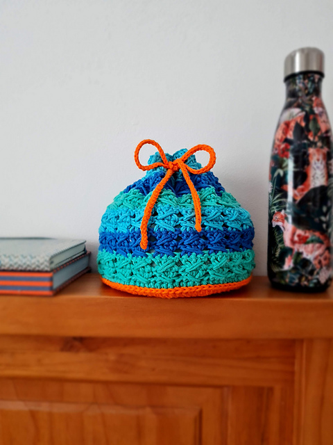 The Arrow Bloom Pouch Bag