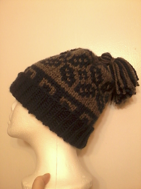 Even at Odds Tasseled Toque