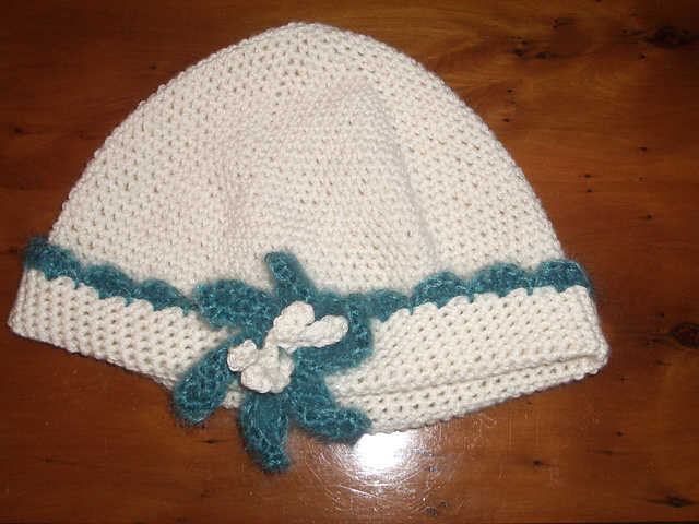 Cloche hat with flower