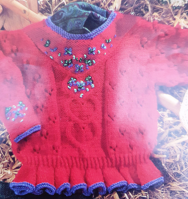 Embroidered Peplum Sweater