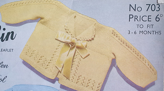 First size matinee jacket with moss stitch yoke