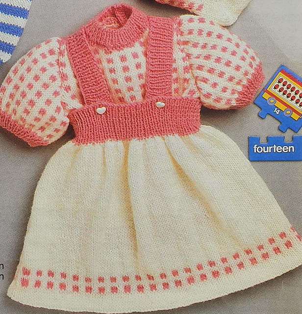 Short sleeved pullover, pinafore and socks