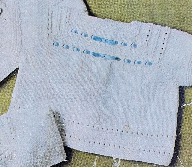 Back buttoning angel top