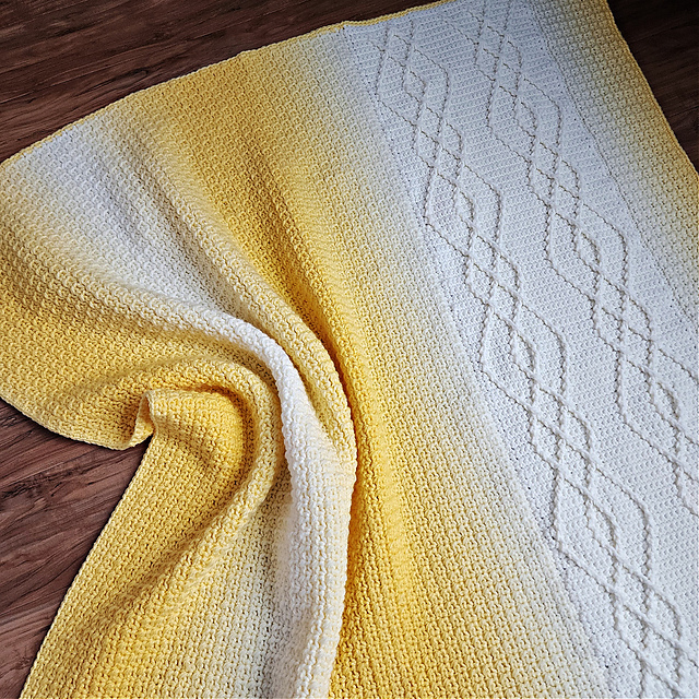 Ravelry: Aelia Cable Crochet Blanket pattern by Jennifer Renaud