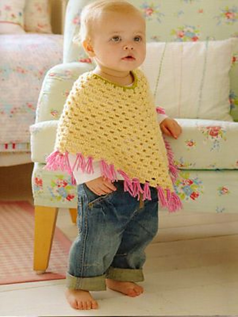 Tassled baby poncho