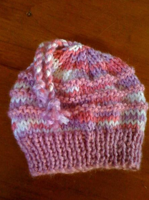 Infants beanie with tassels