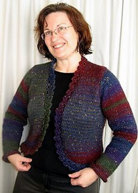 Cardigan with shaped fronts, back and sides with set-in sleeves