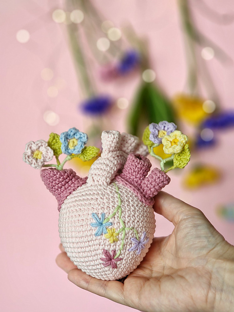 Forget-me-not flower bouquet in heart vase