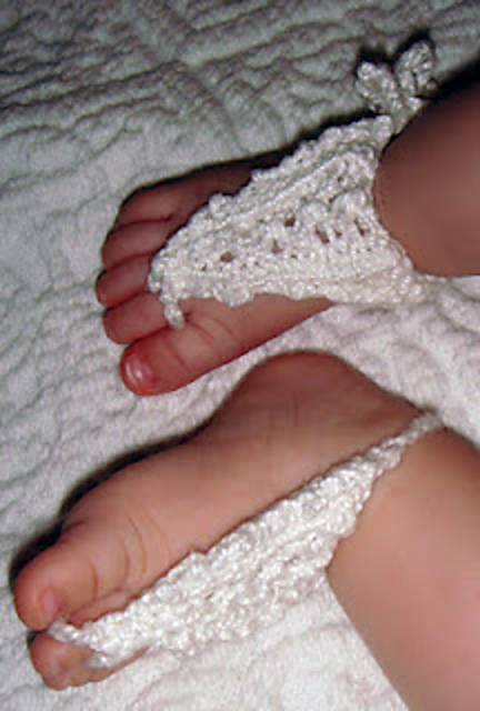 Tiny lace sandals