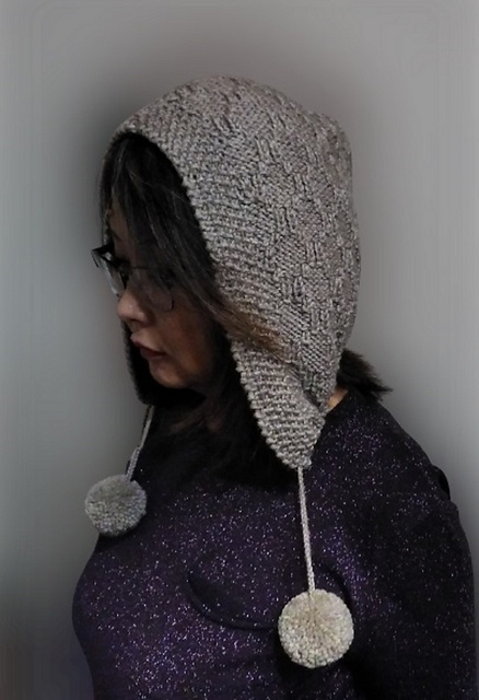 hood with pom poms