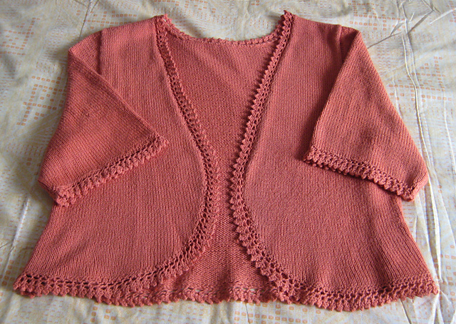 Bolero with short set-in sleeves and lace edging