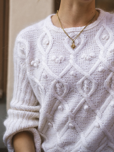 travel sweater reinforced stitching closeup