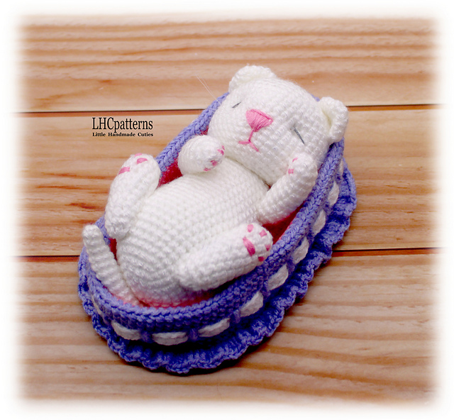 Sleeping Kitten in Cradle
